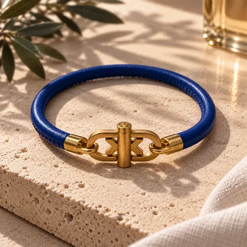 Nos bijoux pour bracelet cuir nappa bleu dorée