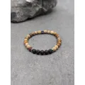 Bracelet en bois fossilisé dépoli et pierre de lave 6mm